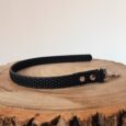 Black Super-Grip Waterproof Training Tab Obedience Lead displayed on natural wood, showcasing textured grip surface and antique brass hardware.