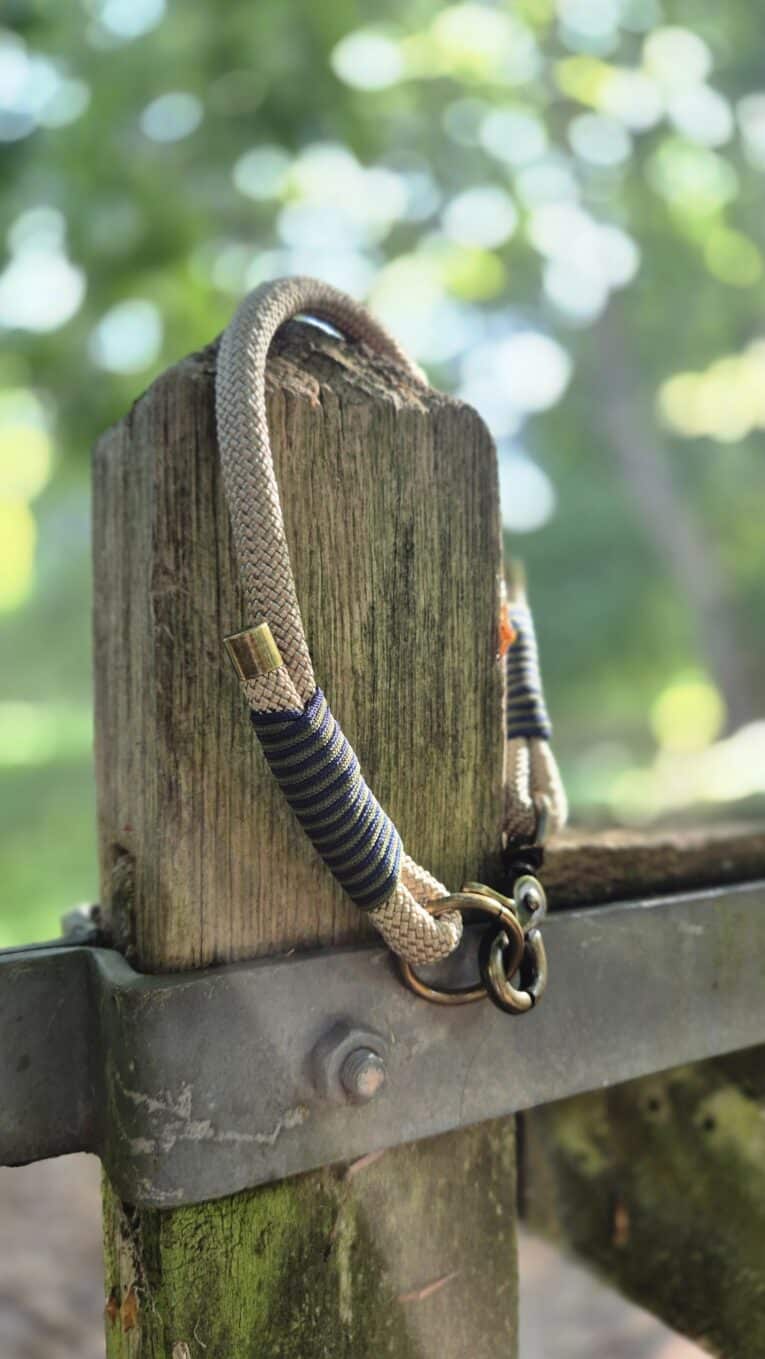 Aubreys x Lutchfords collaboration paracord collar and BioThane lead in beige, navy and olive with antique brass hardware.