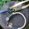 Aubreys x Lutchfords collaboration paracord collar and BioThane lead in beige, navy and olive with antique brass hardware.