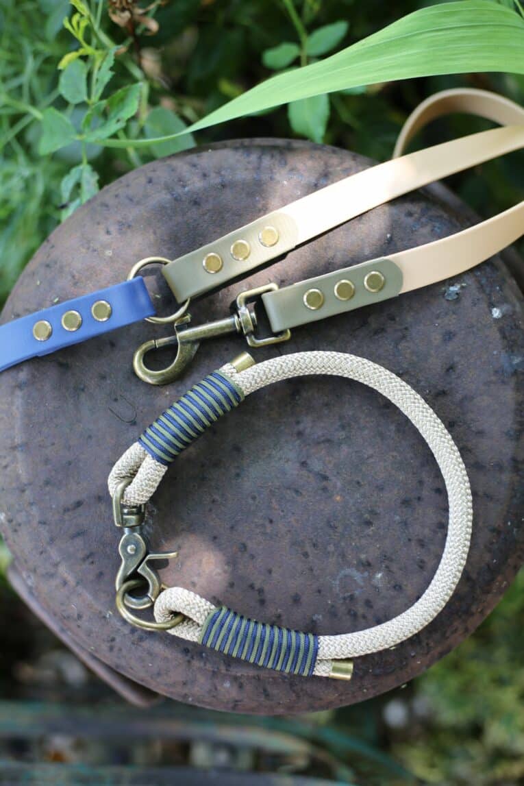 Aubreys x Lutchfords collaboration paracord collar and BioThane lead in beige, navy and olive with antique brass hardware.