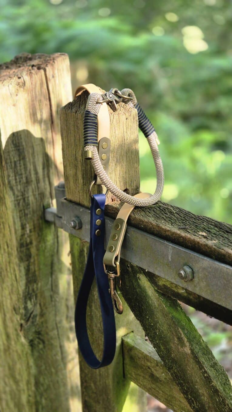Aubreys x Lutchfords paracord collar and BioThane lead in beige, navy, and olive with antique brass hardware.