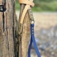 Aubreys x Lutchfords collaboration lead in beige and navy blue, featuring antique brass hardware and BioThane construction.